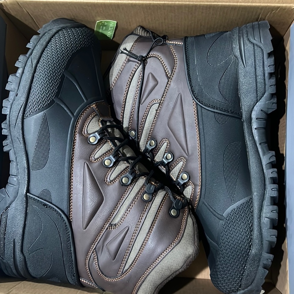 New boots in box with tags